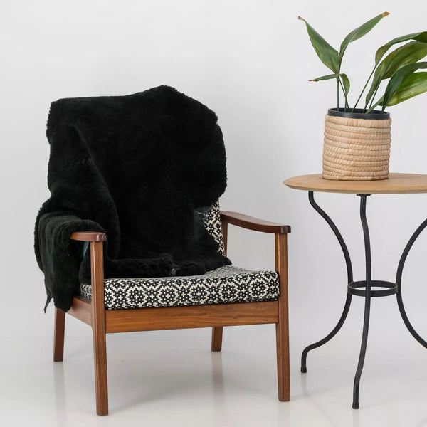 South African Merino Sheepskin , black , on chair