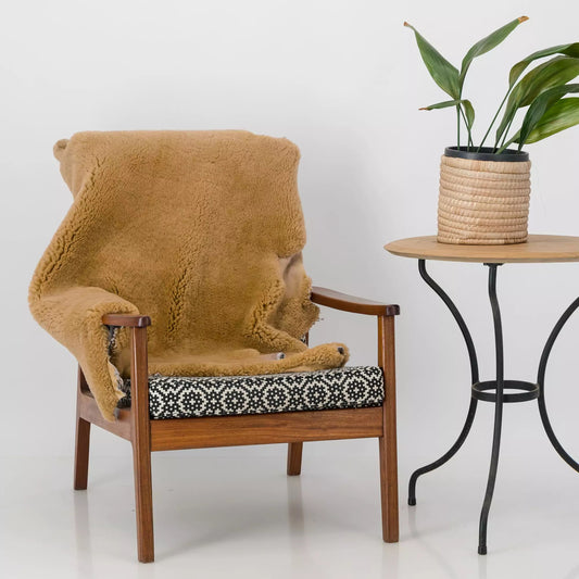 South African Merino Sheepskin , rosegold , on chair